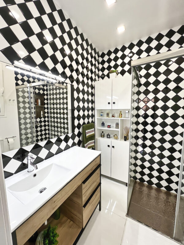 stylish black and white tiled bathroom of a villa/ Quinta in Funchal