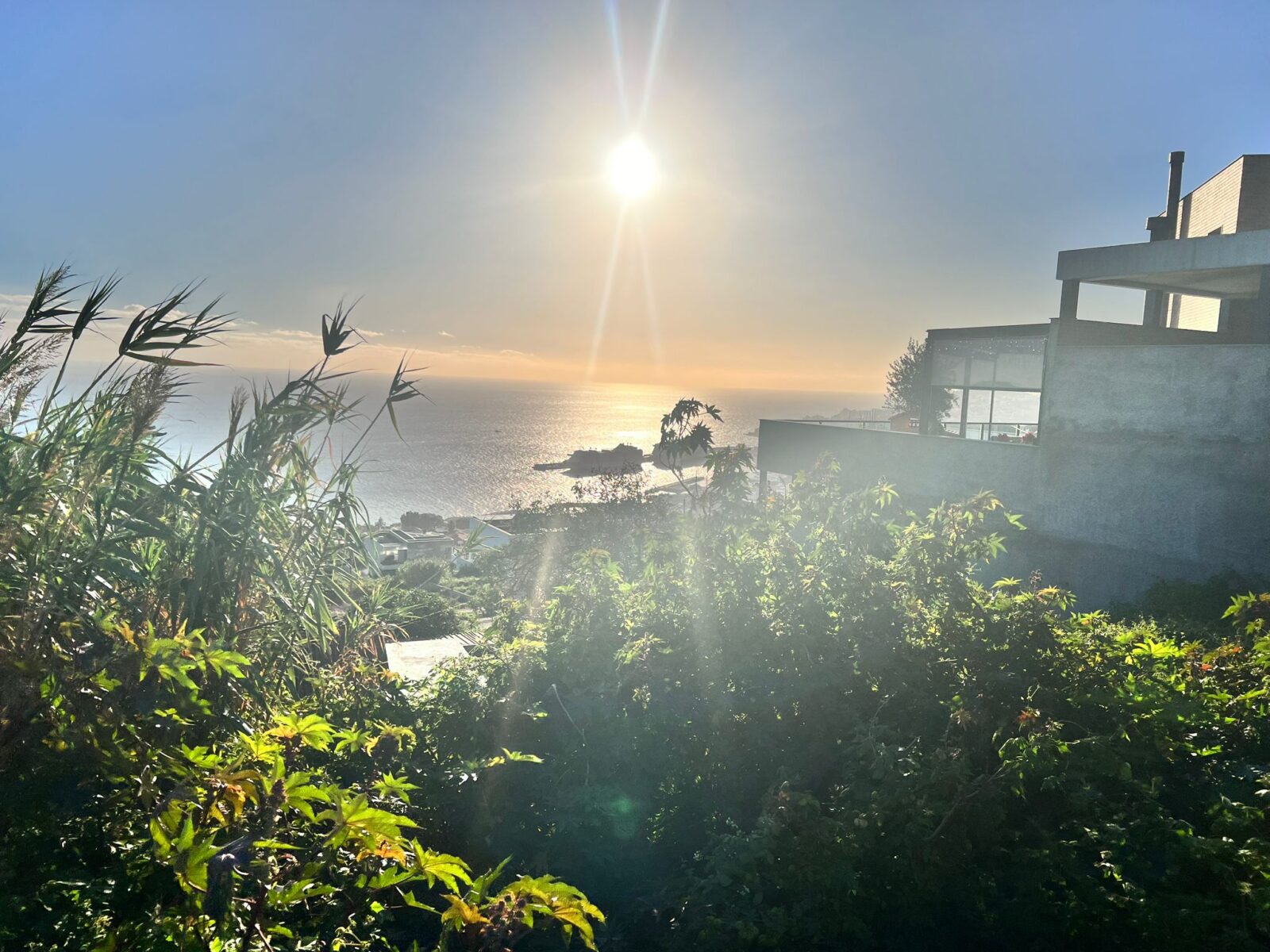 Morning Sun rising over building plot in Funchal Madeira island