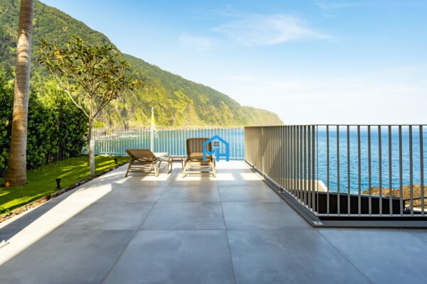 Sun beds with view of the ocean bay